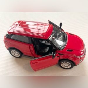 Beautiful Red Range Rover pull back car in great used condition